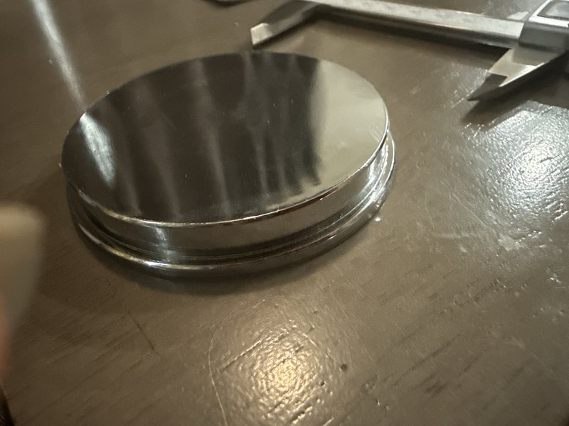 Side view of the stepped steel disc
